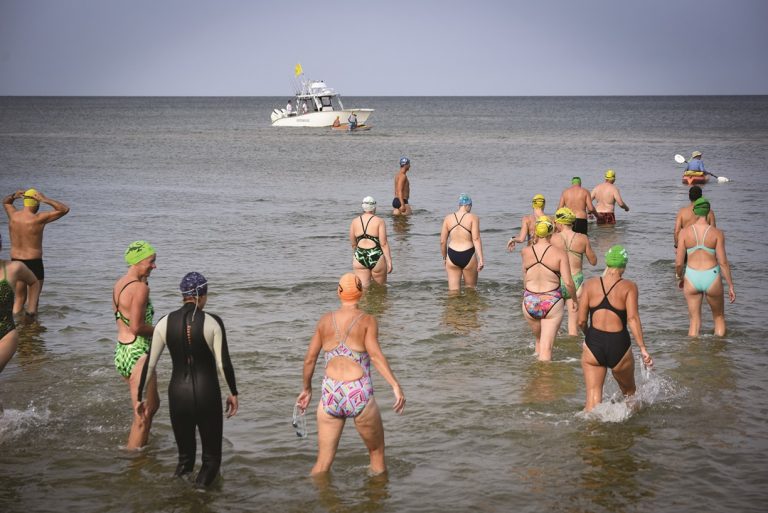 Swimmers Gathered for Cross-Bay Relay Thwarted by Weather
